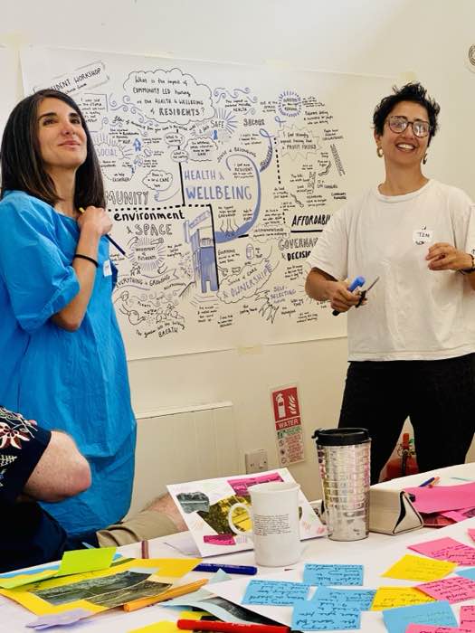 Sahar Nava with the live illustrator at the resident co-design workshop
